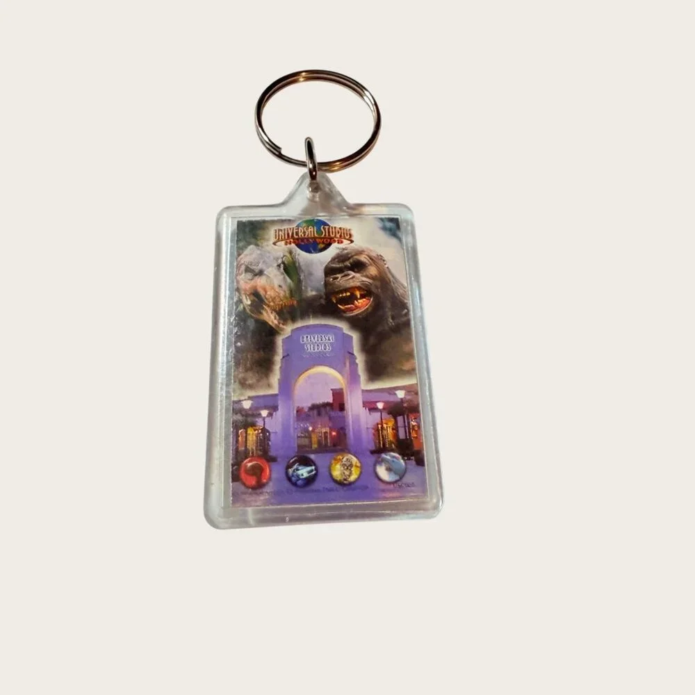 Universal Studios Keychain Keyring With Jurassic Park and King Kong Design